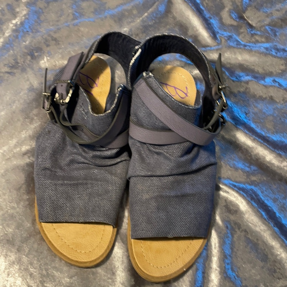 Ladies shoes size 9.5. Blue denim color. Zipper closure. Buckle and strap